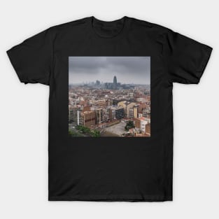 Barcelona skyline under heavy grey clouds T-Shirt